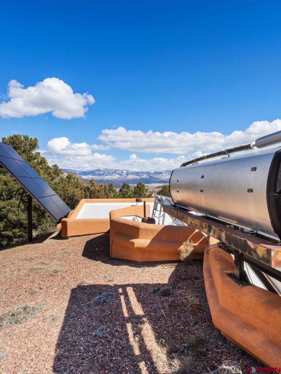 1137 Pleasant Point Drive Ridgway, CO 81432 - Photo 30 of 34 a view of a swimming pool with lounge chair