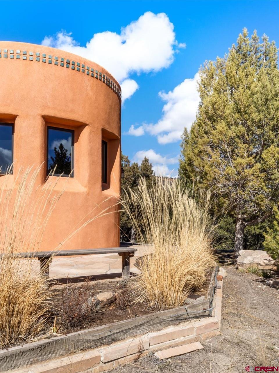 1137 Pleasant Point Drive Ridgway, CO 81432 - Photo 4 of 34 a view of a house with a yard