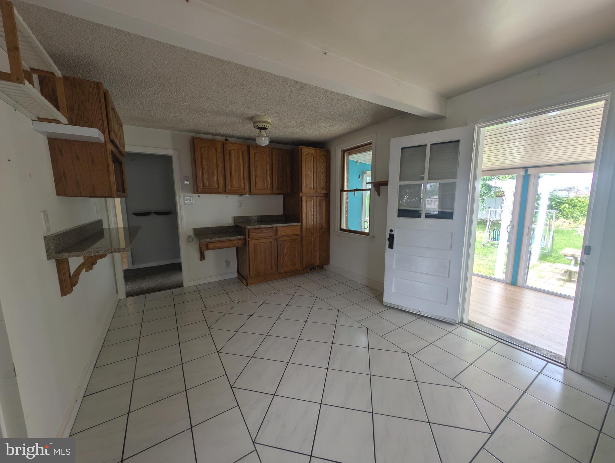 1129 Providence Road Springfield, PA 19064 - Photo 5 of 15 a view of kitchen with windows