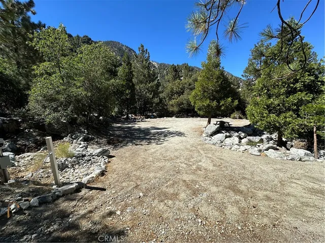a view of a covered with snow in the background
