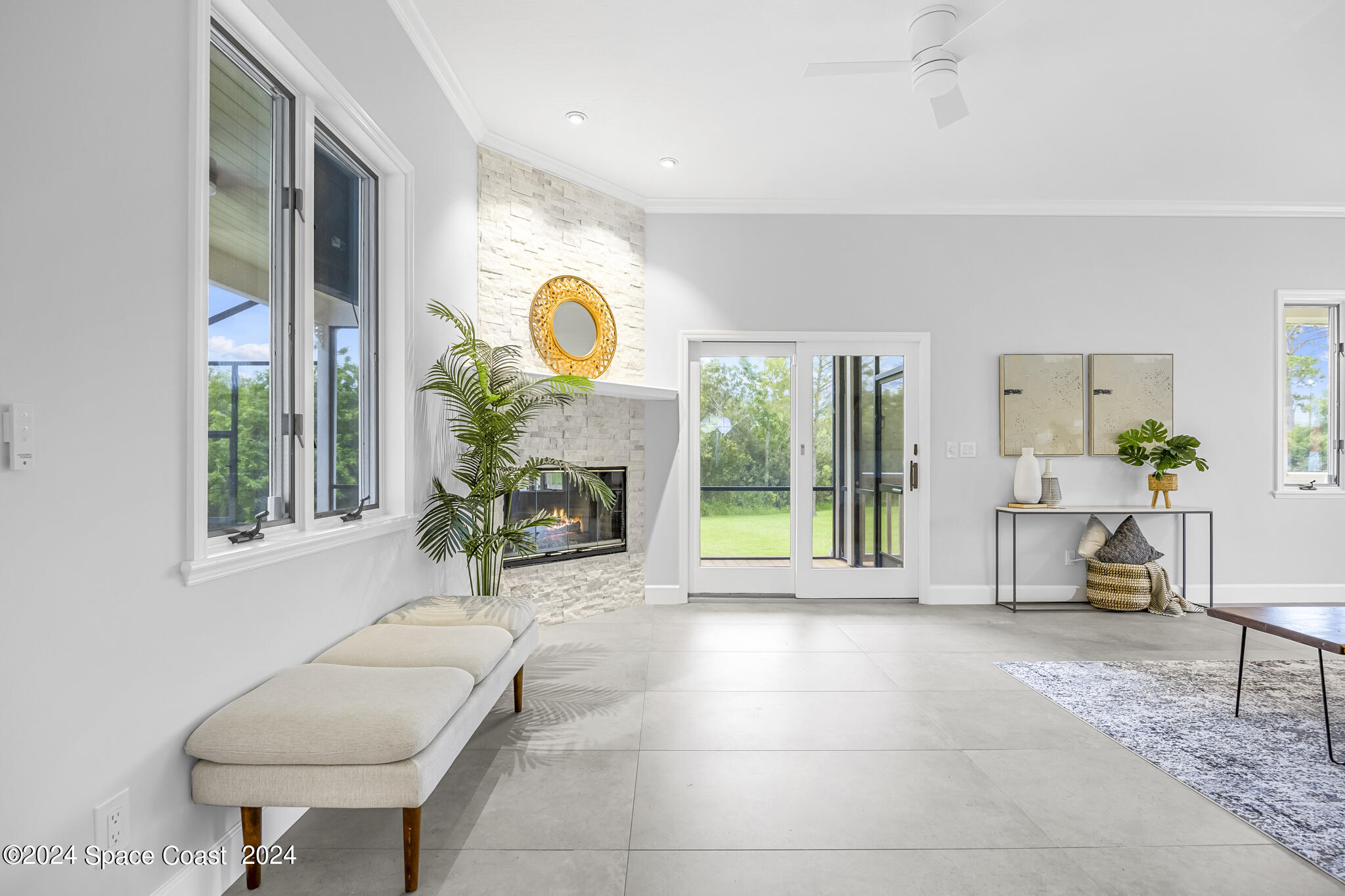 3671 Big Pine Road Melbourne, FL 32934 - Photo 17 of 60 a room with furniture and a large window