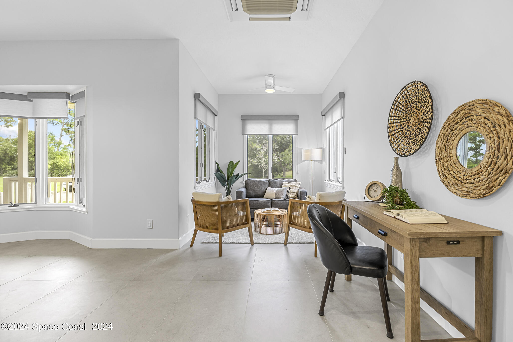3671 Big Pine Road Melbourne, FL 32934 - Photo 24 of 60 a view of a dining room with furniture window and wooden floor