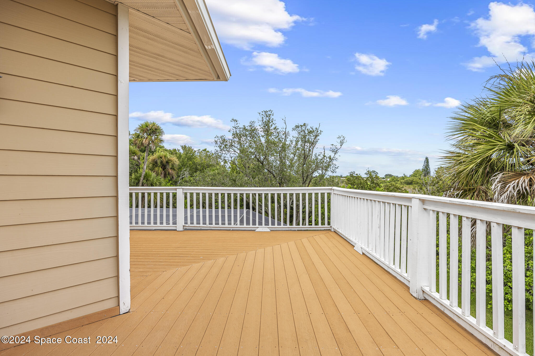 3671 Big Pine Road Melbourne, FL 32934 - Photo 39 of 60 a view of a balcony with a pot