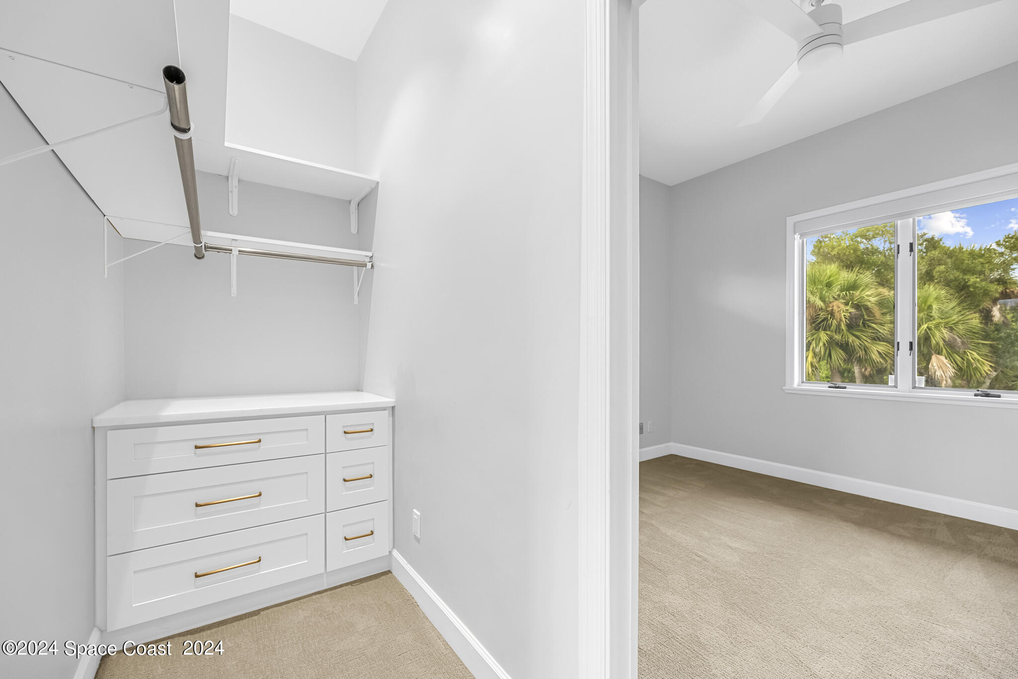 3671 Big Pine Road Melbourne, FL 32934 - Photo 43 of 60 a view of an empty walk in closet