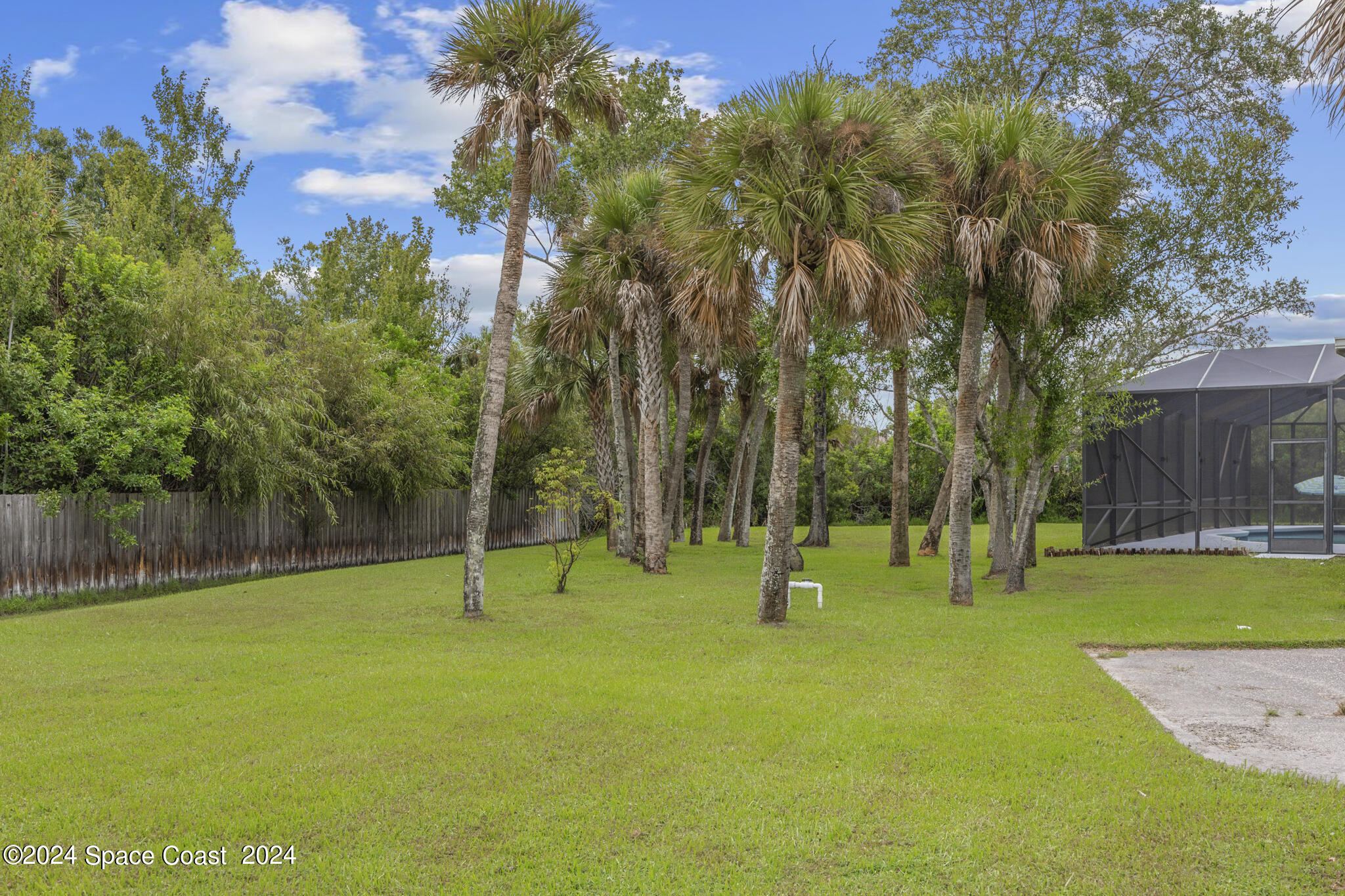 3671 Big Pine Road Melbourne, FL 32934 - Photo 54 of 60 a view of swimming pool with a yard