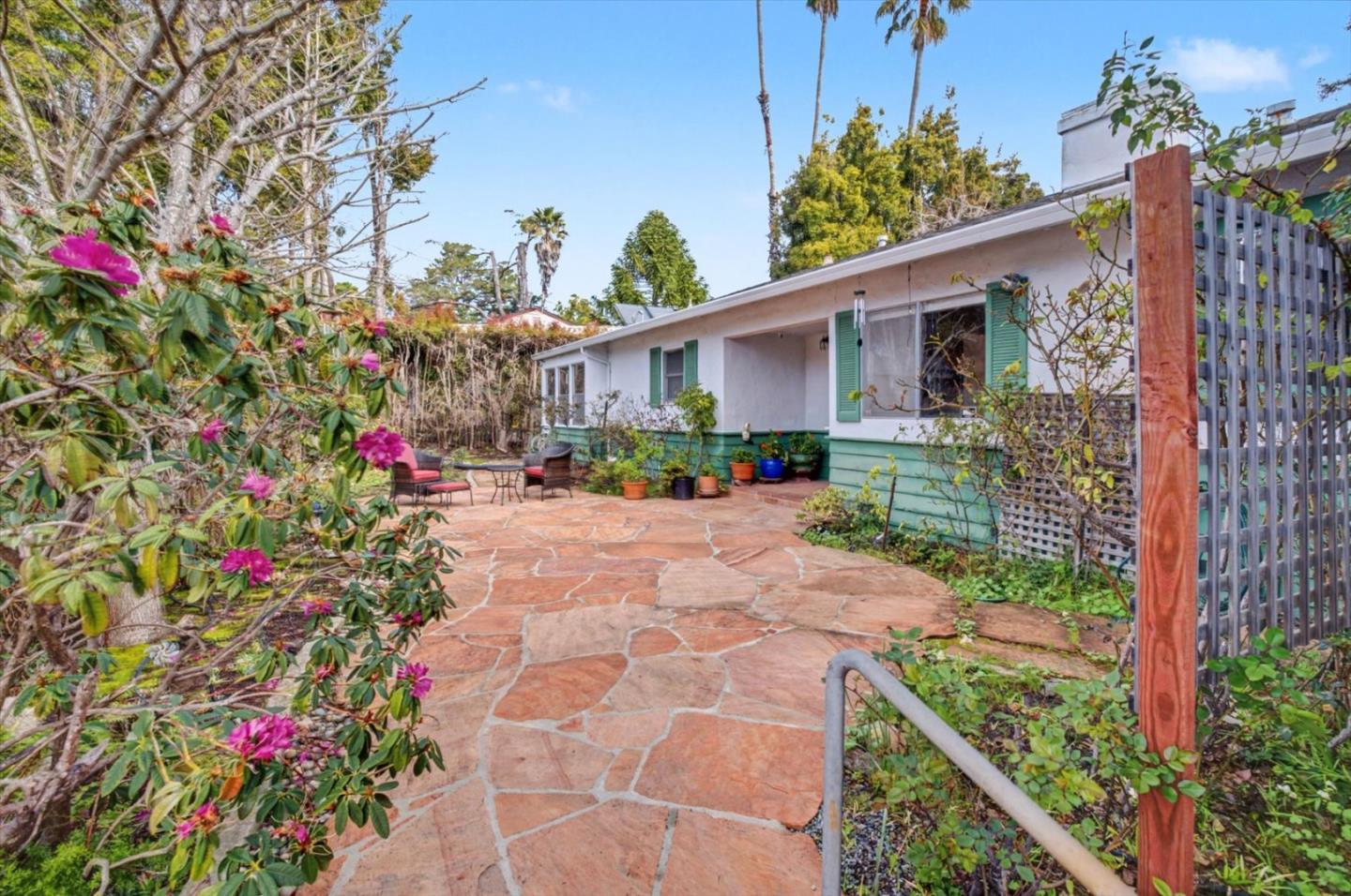 416 Spring Street Santa Cruz, CA 95060 - Photo 3 of 28 a view of a garden with flowers