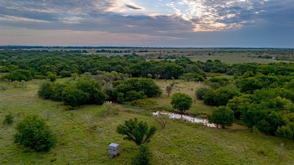 Tbd Gilbert Road Nocona, TX 76255 - Photo 23 of 40 a view of a green yard with houses