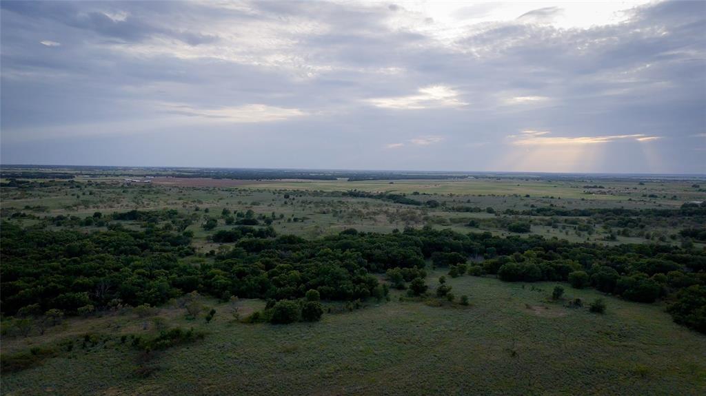 Tbd Gilbert Road Nocona, TX 76255 - Photo 32 of 40 a view of a big yard with lots of green space and mountain view in back