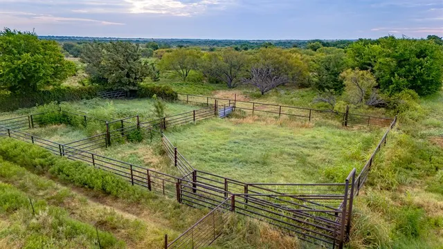 a view of a lake with a yard