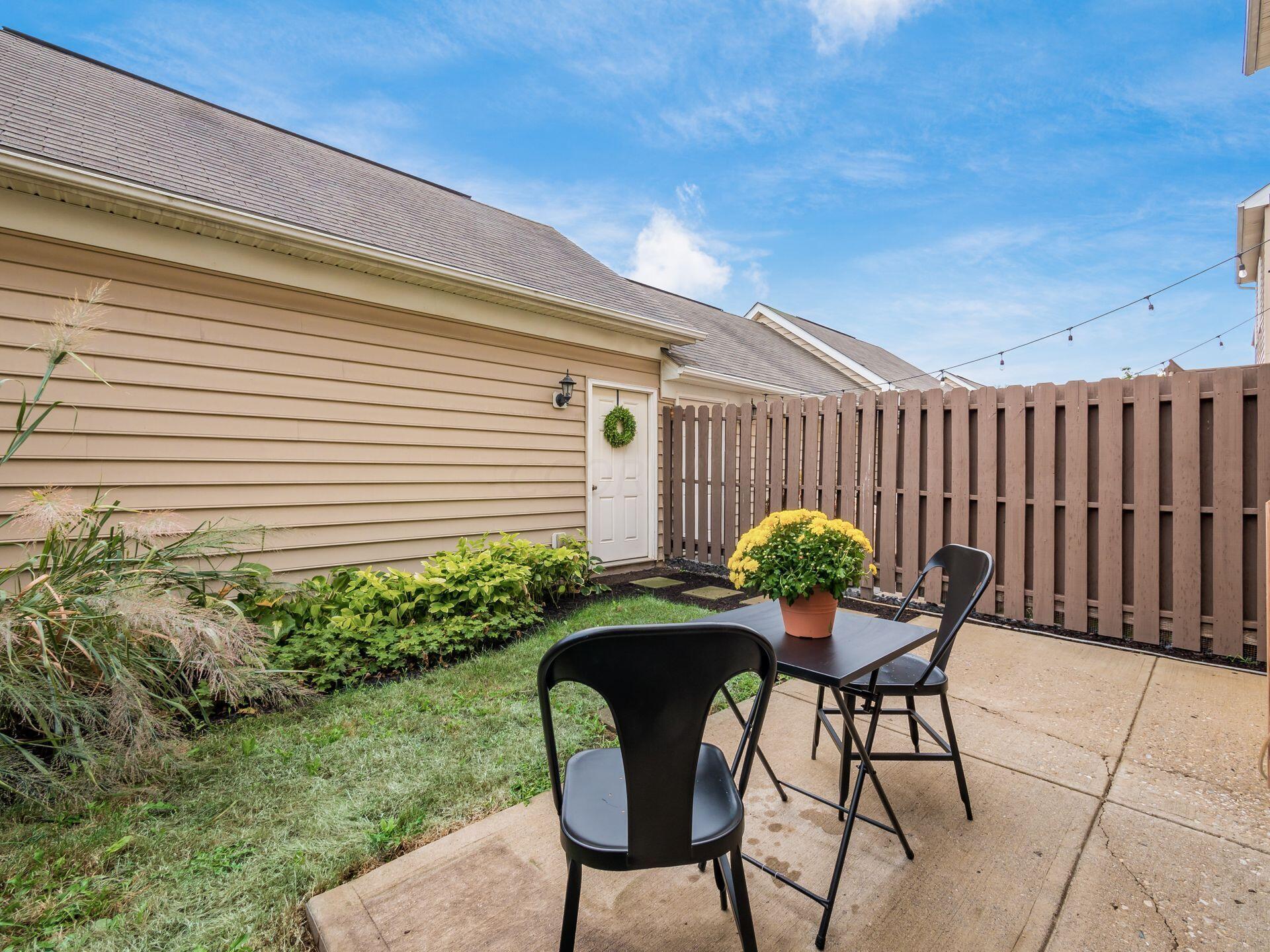 6305 Needletail Road, Unit 25 Columbus, OH 43230 - Photo 37 of 49 The backyard features patio and landscaped space for entertainment, pets and gardening.