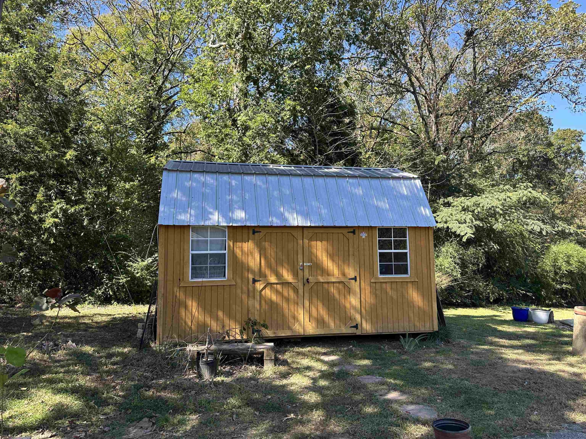 155 Lewter Road Crump, TN 38327 - Photo 11 of 33 a view of a back yard of the house