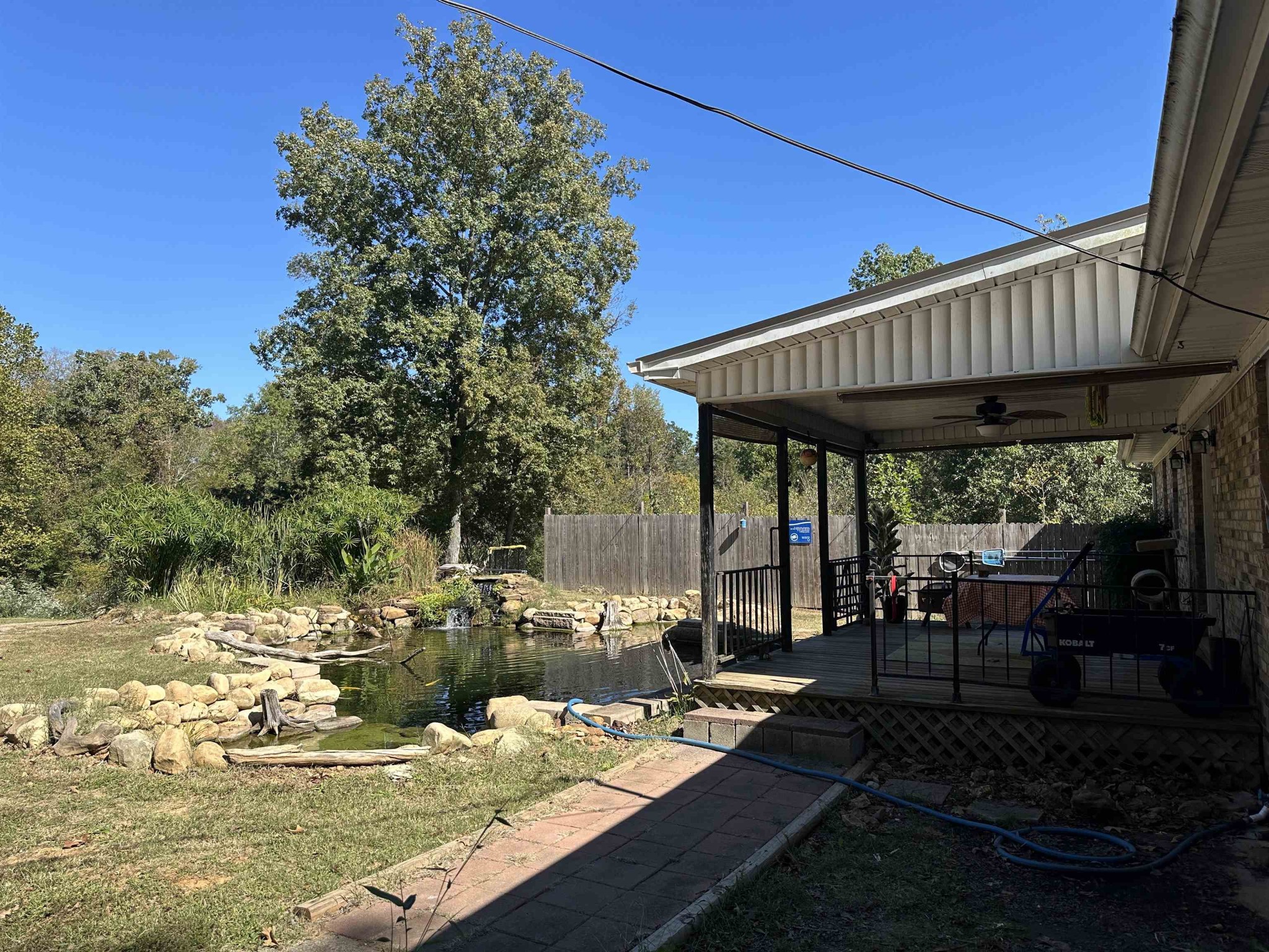 155 Lewter Road Crump, TN 38327 - Photo 14 of 33 a view of a swimming pool with a patio