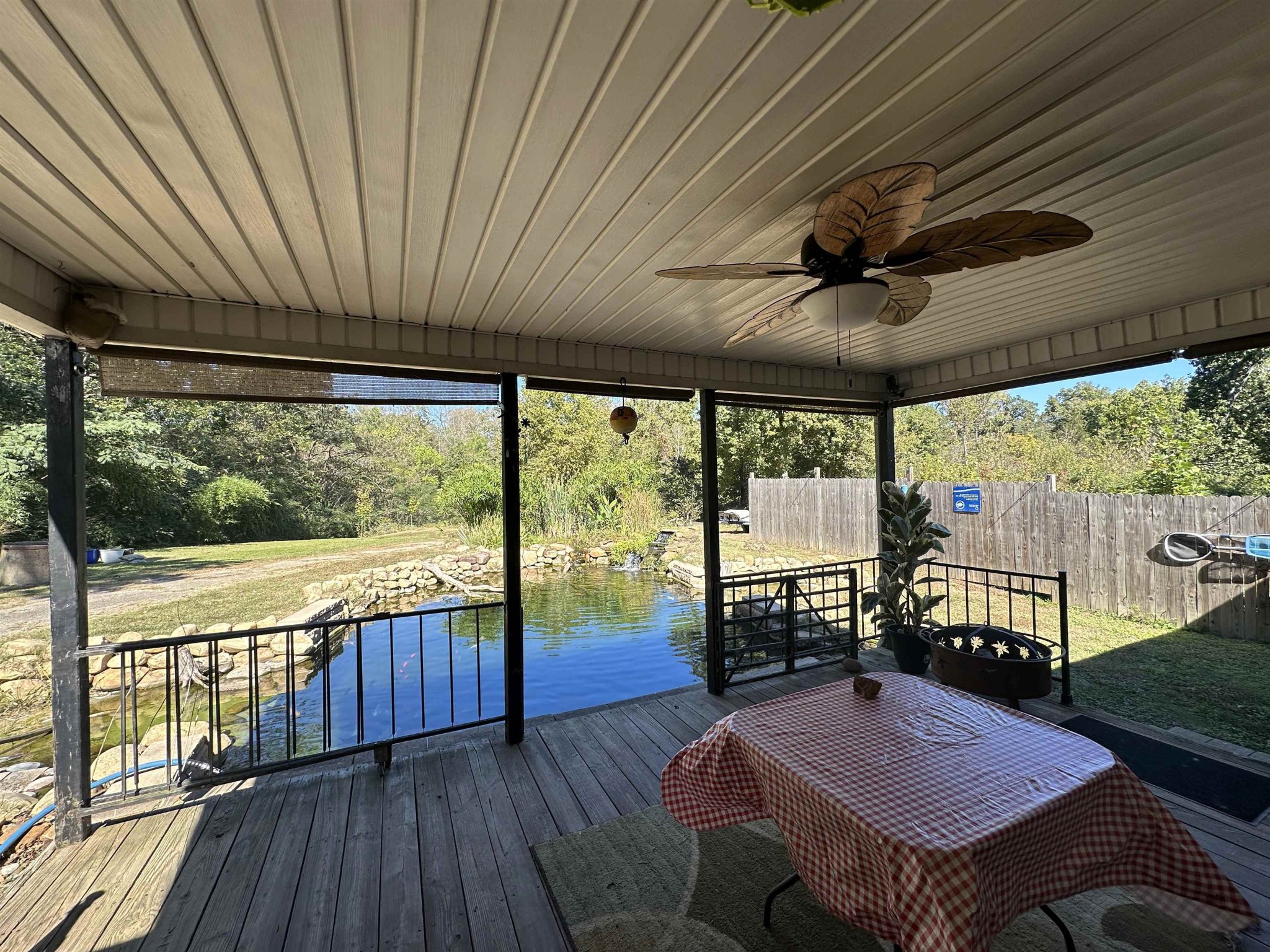 155 Lewter Road Crump, TN 38327 - Photo 15 of 33 a view of a balcony with furniture and wooden floor
