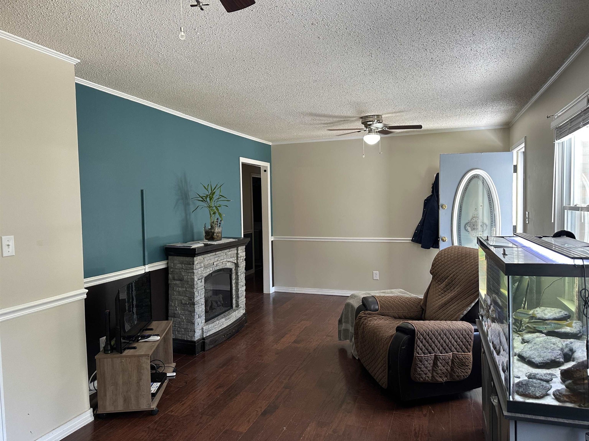155 Lewter Road Crump, TN 38327 - Photo 18 of 33 a living room with furniture and a fireplace
