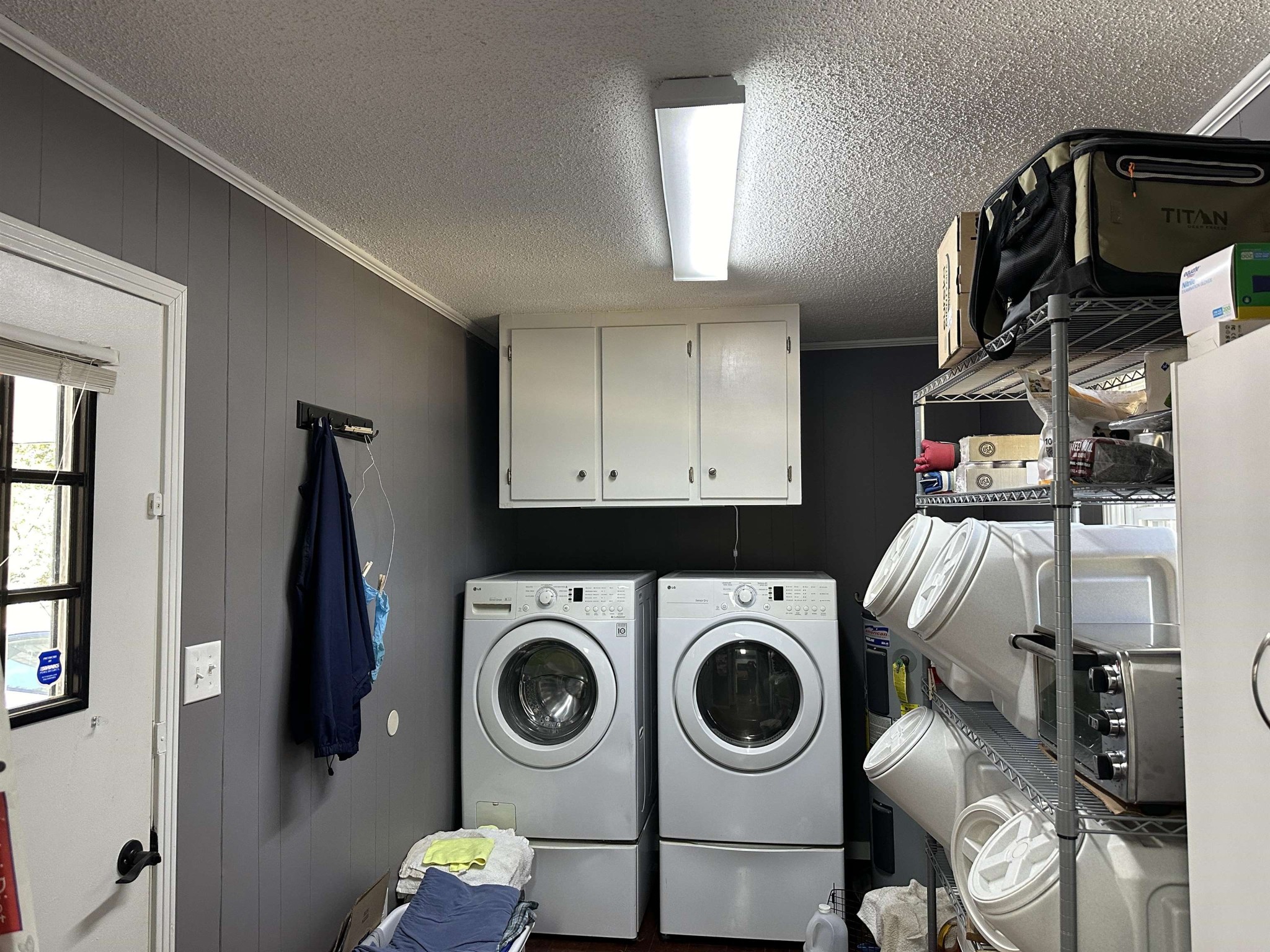 155 Lewter Road Crump, TN 38327 - Photo 22 of 33 a utility room with dryer and washer