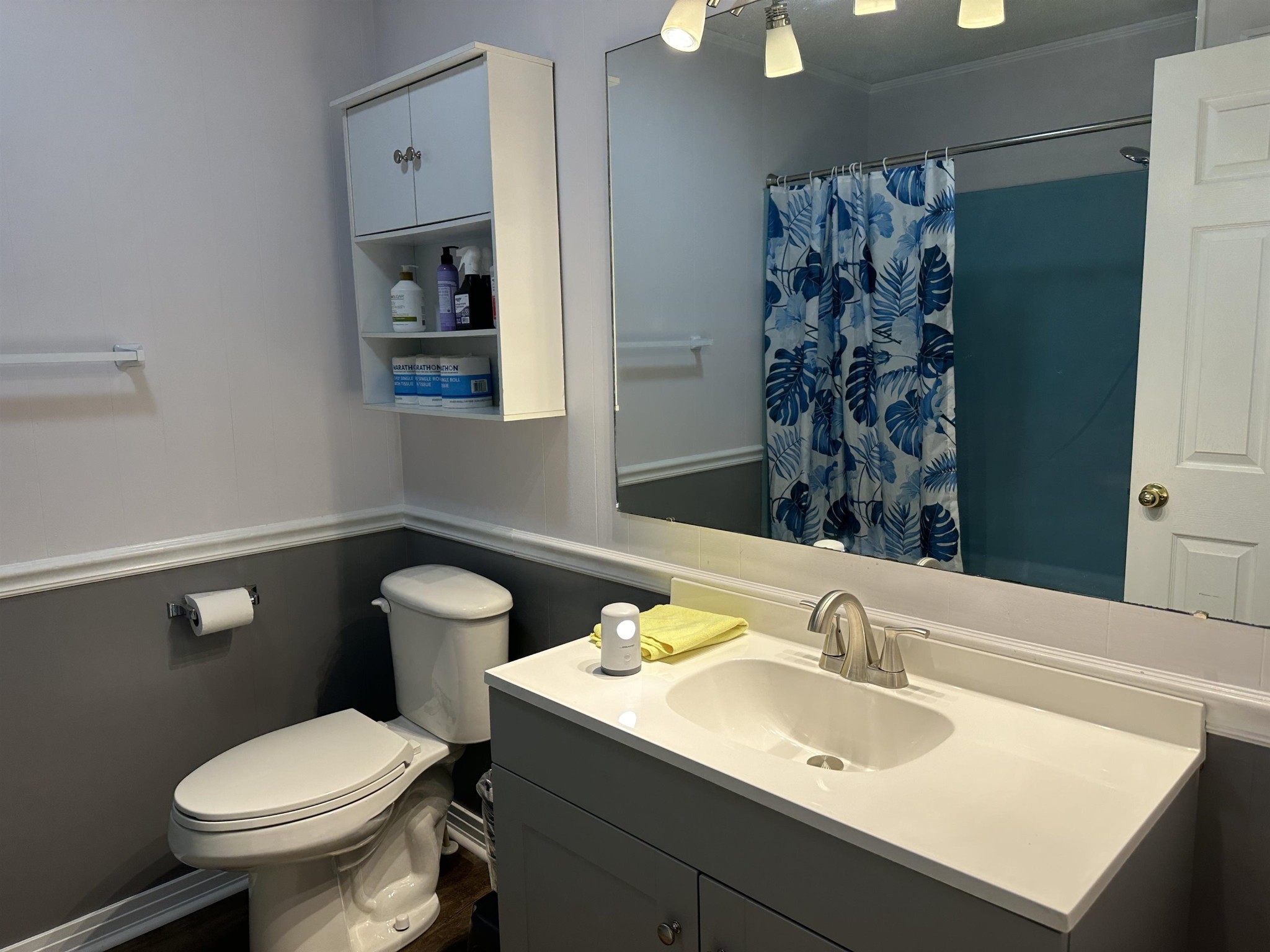 155 Lewter Road Crump, TN 38327 - Photo 27 of 33 a bathroom with a sink toilet and a mirror