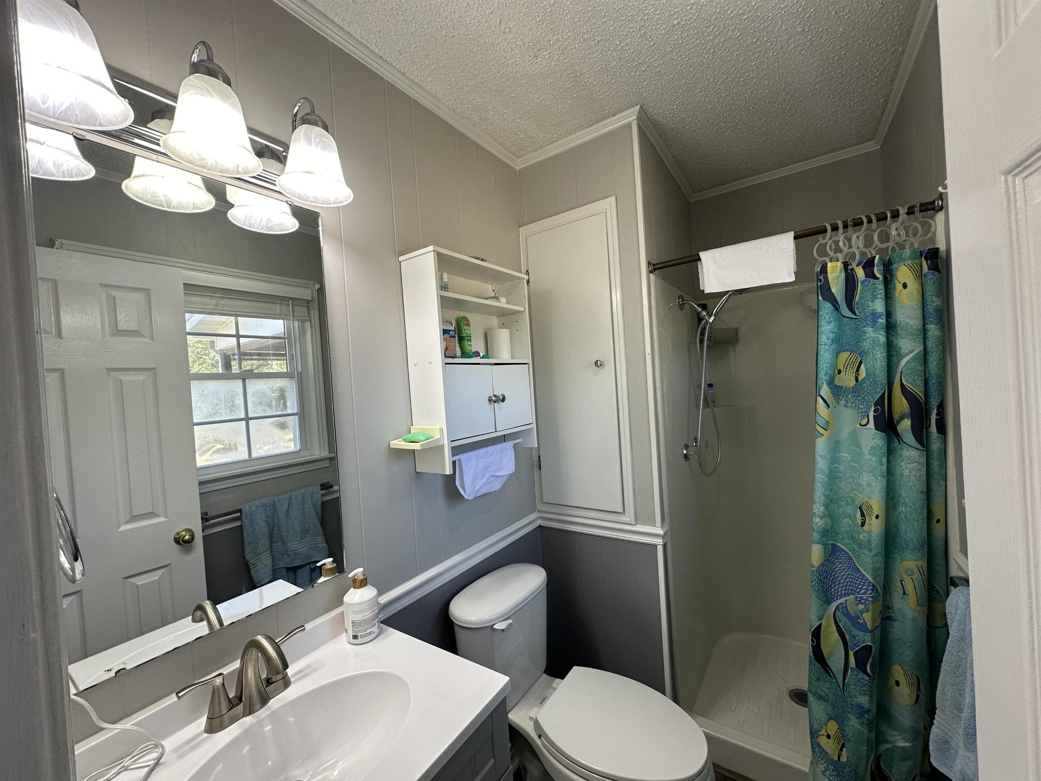 155 Lewter Road Crump, TN 38327 - Photo 31 of 33 a bathroom with a toilet a sink and shower