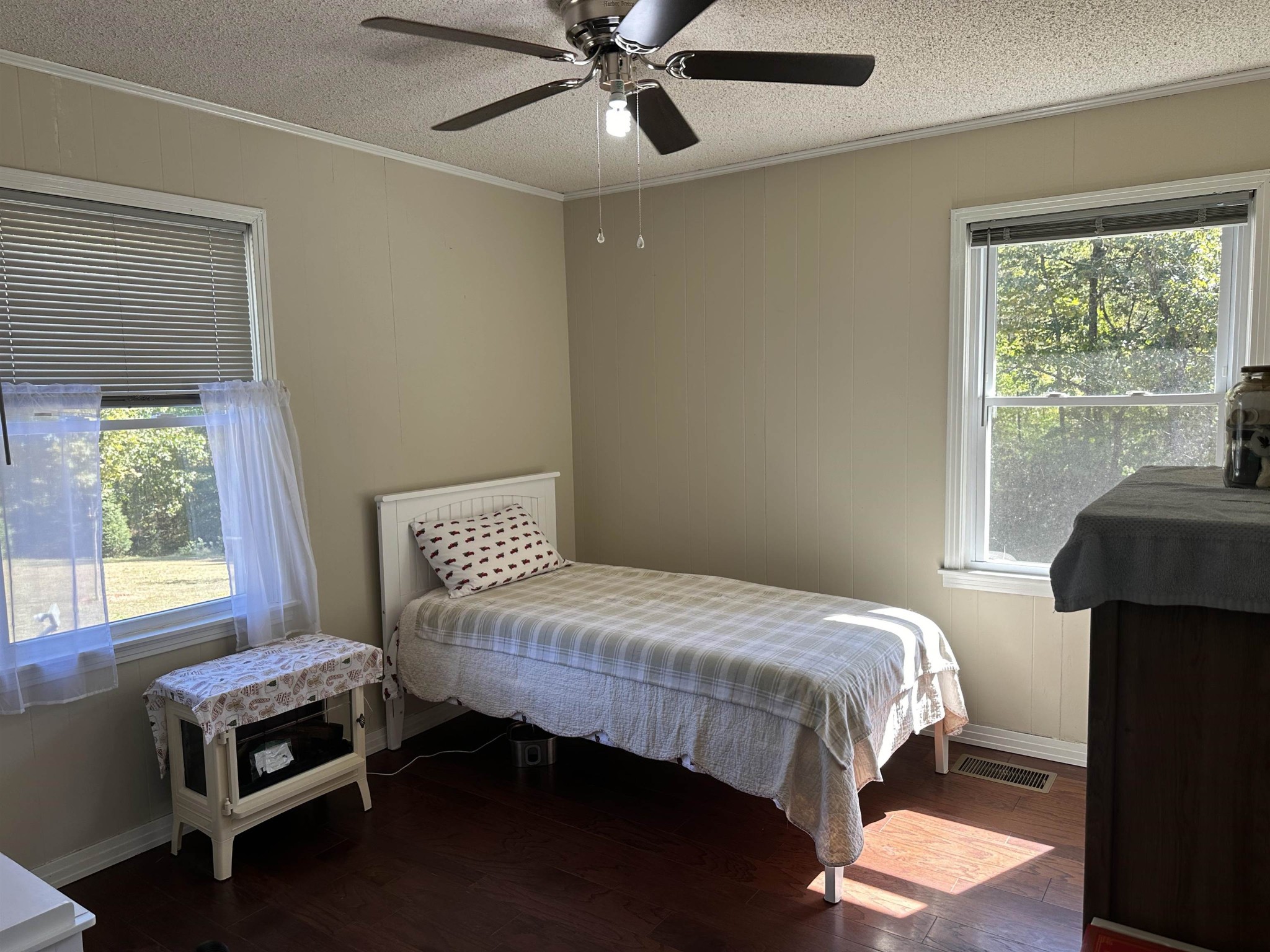 155 Lewter Road Crump, TN 38327 - Photo 32 of 33 a bedroom with a bed and a window