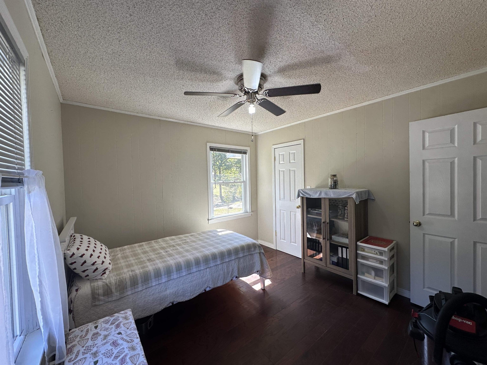 155 Lewter Road Crump, TN 38327 - Photo 33 of 33 a bedroom with a bed and a window