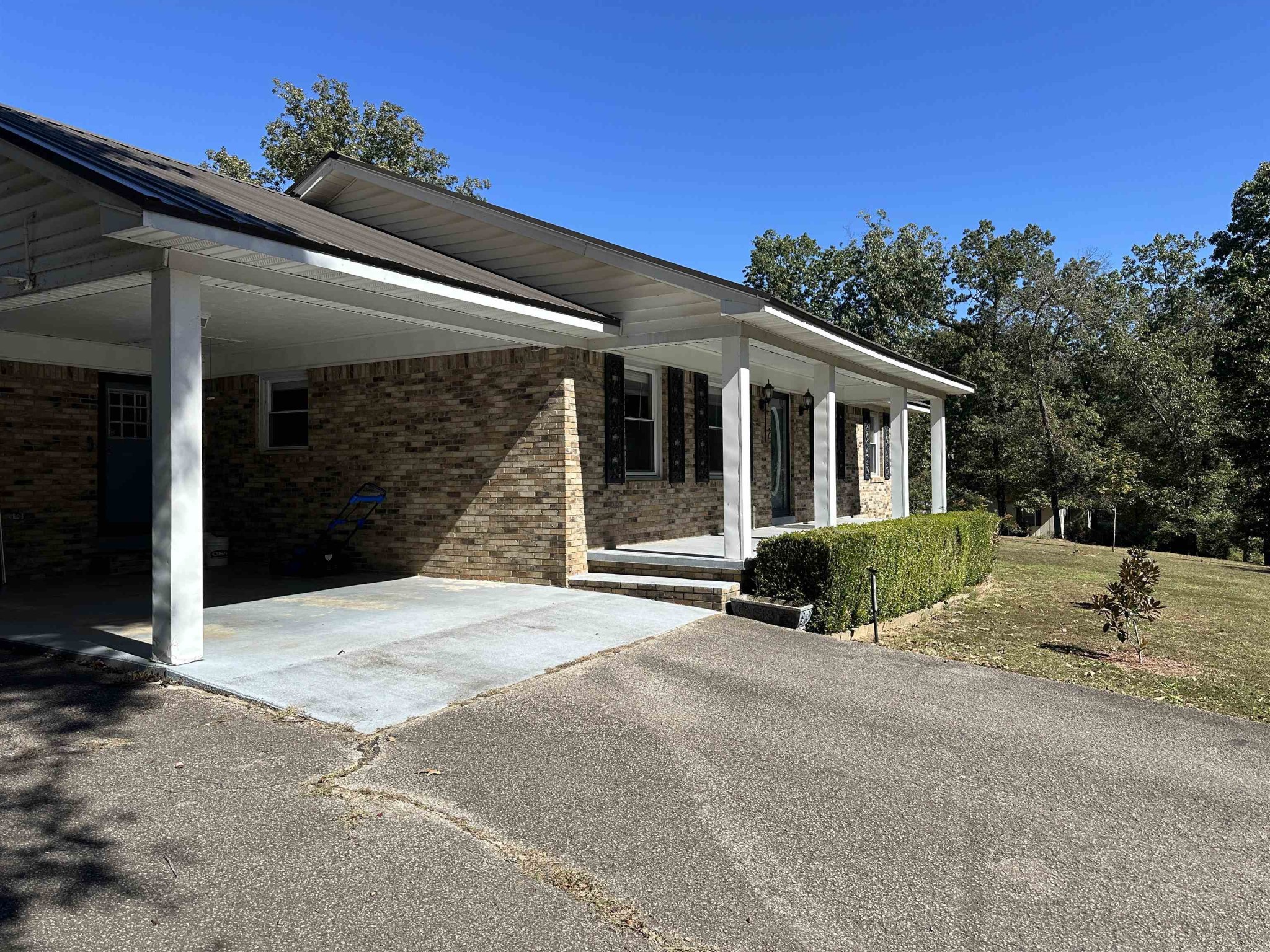 155 Lewter Road Crump, TN 38327 - Photo 6 of 33 a view of a house with a patio