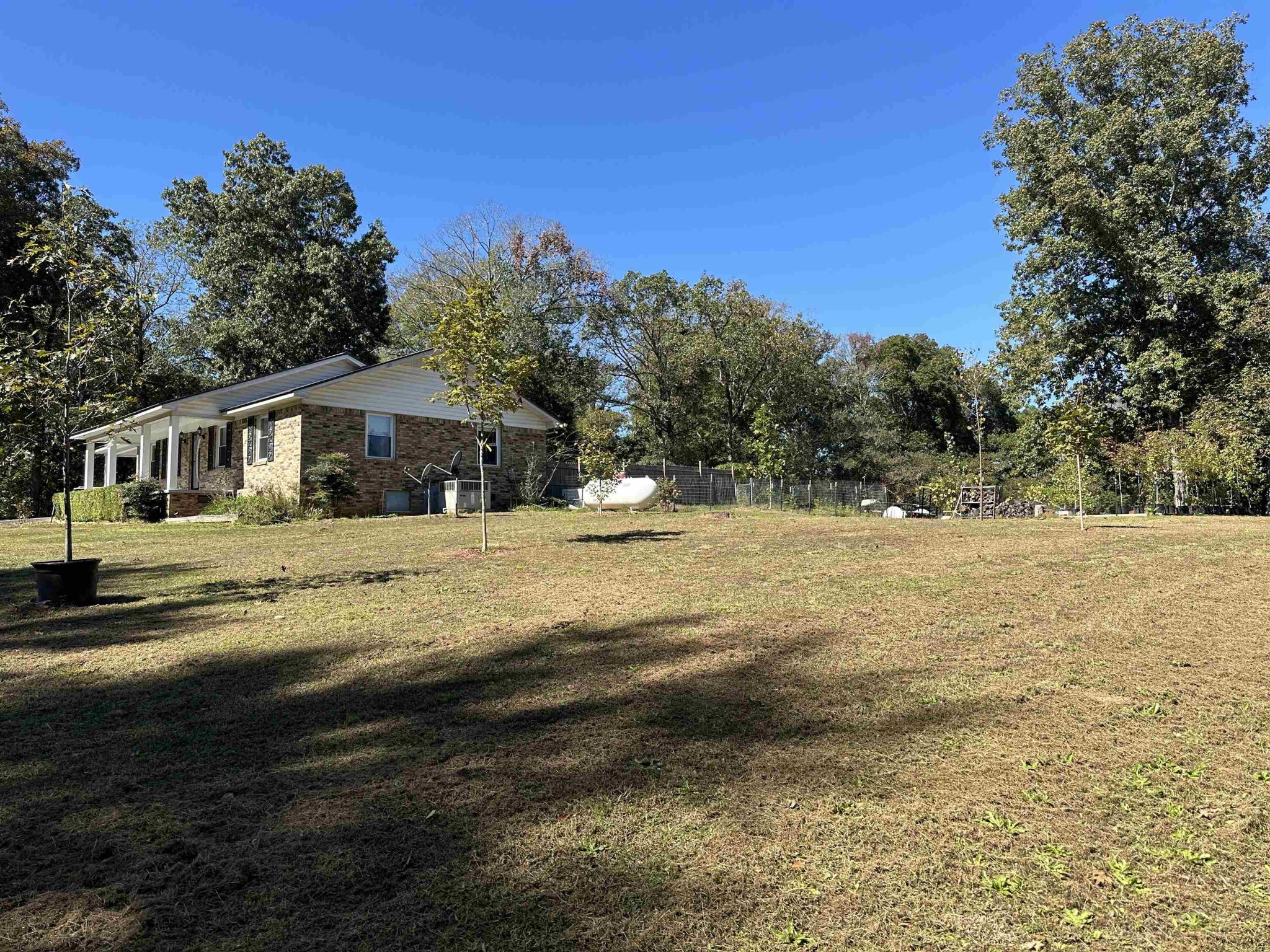 155 Lewter Road Crump, TN 38327 - Photo 7 of 33 a view of house with outdoor space