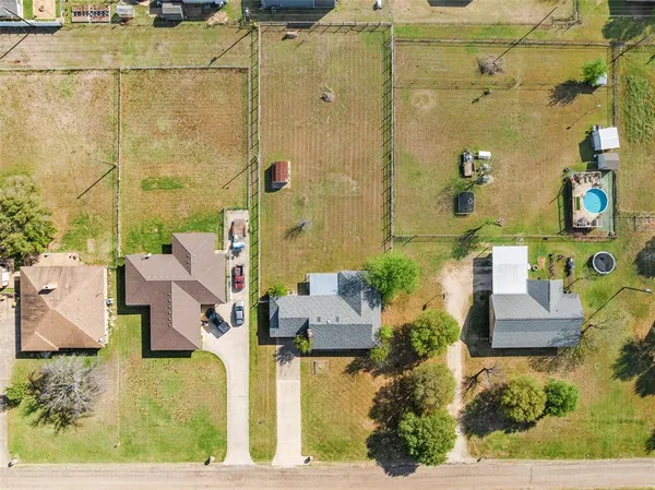 aerial view of residential houses with outdoor space
