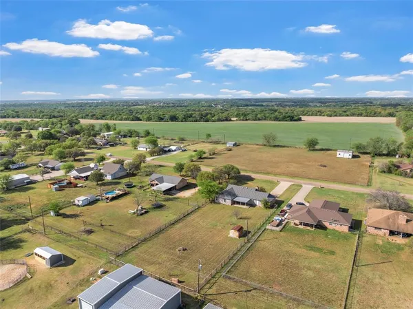 a view of a city with lawn chairs
