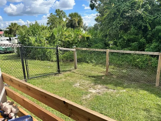 a view of a yard from a balcony