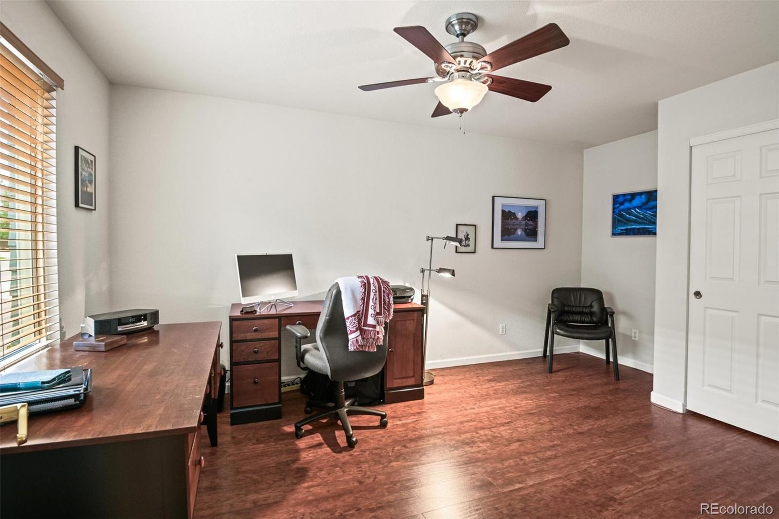 10230 Rustic Redwood Way Highlands Ranch, CO 80126 - Photo 18 of 50 a workspace with furniture and a window