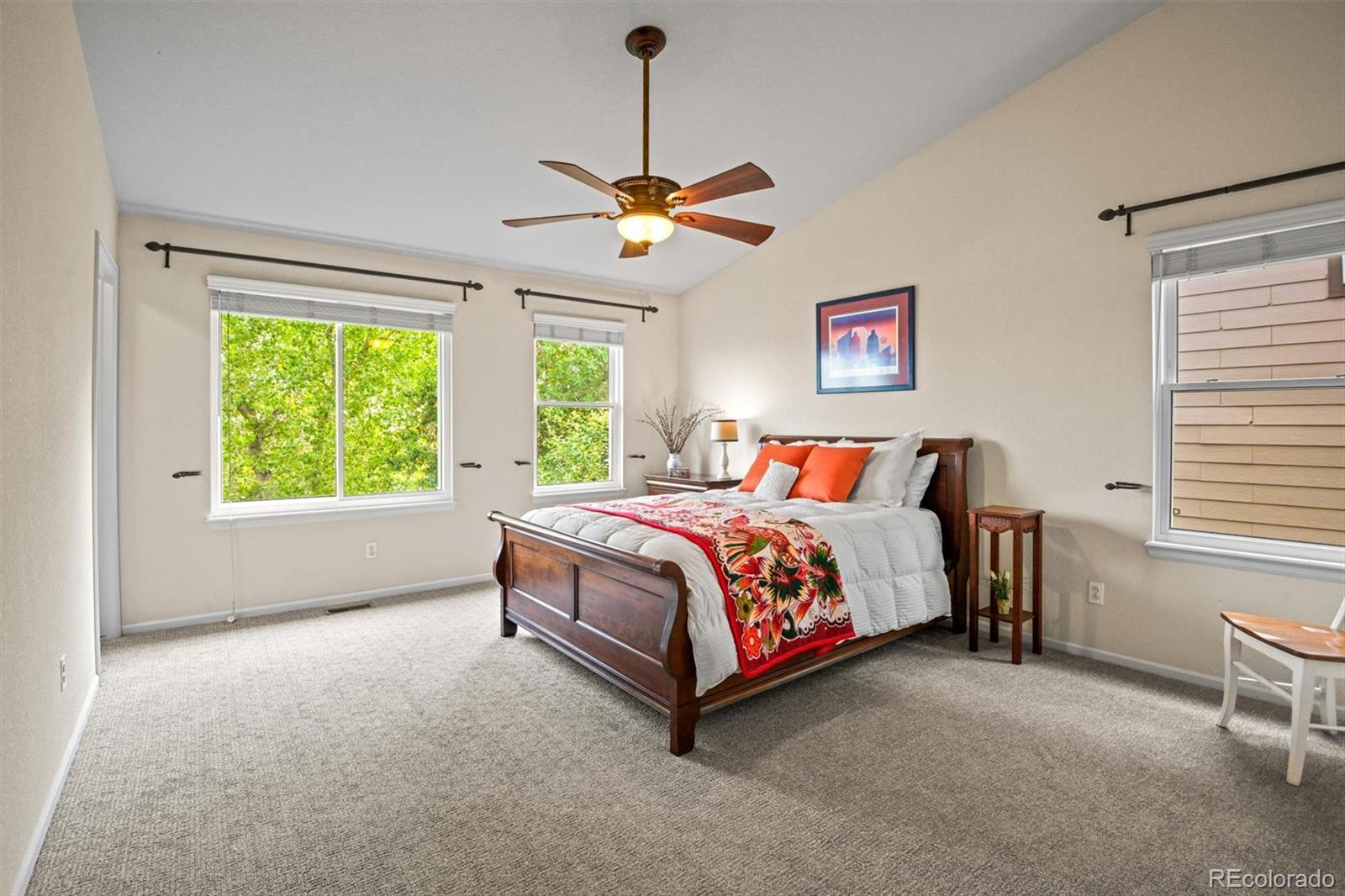 10230 Rustic Redwood Way Highlands Ranch, CO 80126 - Photo 21 of 50 a bedroom with a bed and a window