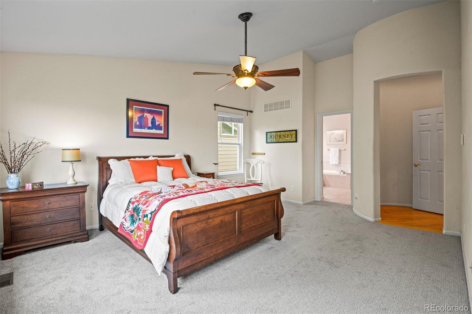 10230 Rustic Redwood Way Highlands Ranch, CO 80126 - Photo 22 of 50 a bedroom with bed and window