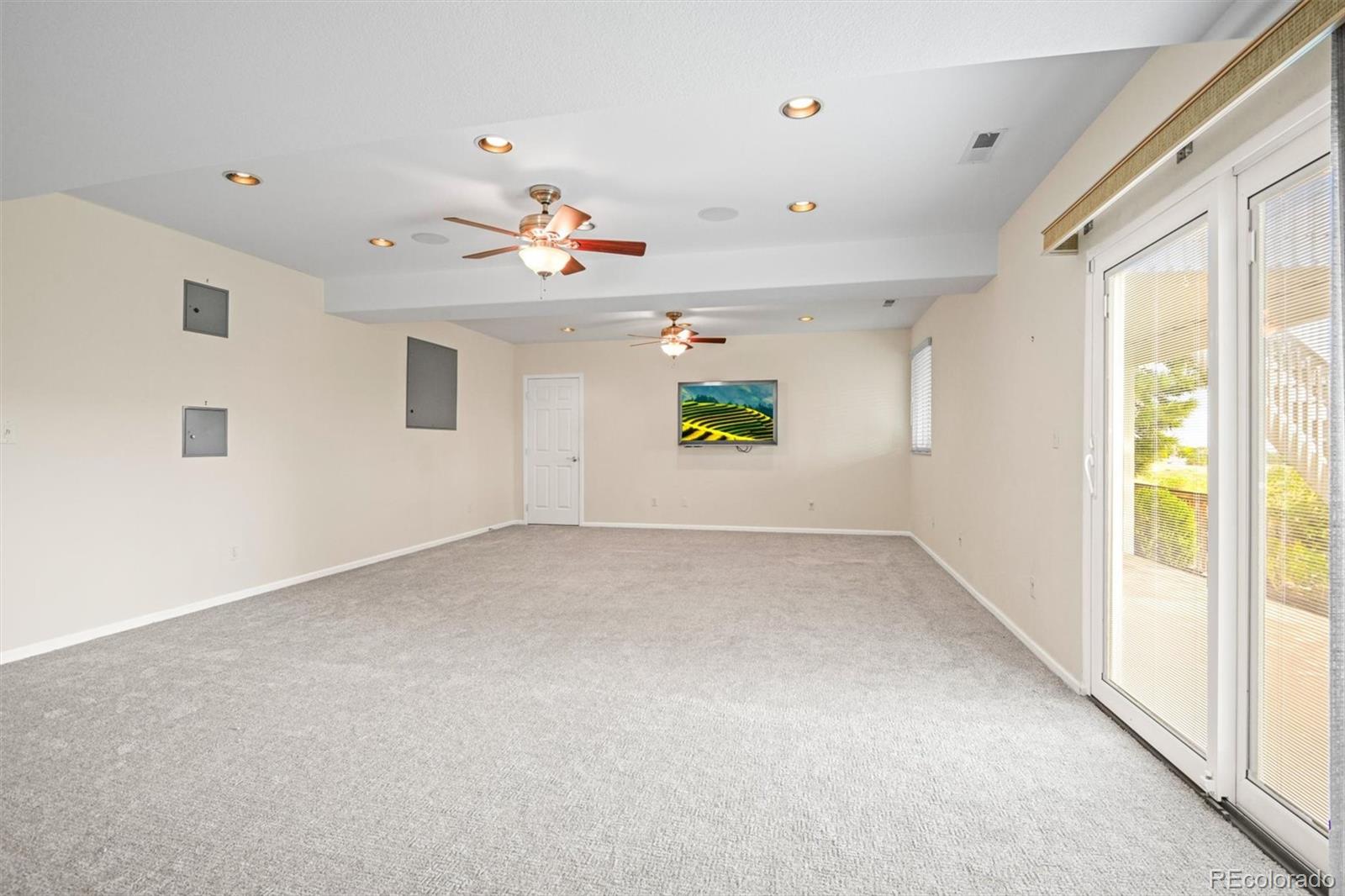 10230 Rustic Redwood Way Highlands Ranch, CO 80126 - Photo 30 of 50 a view of an empty room with a window