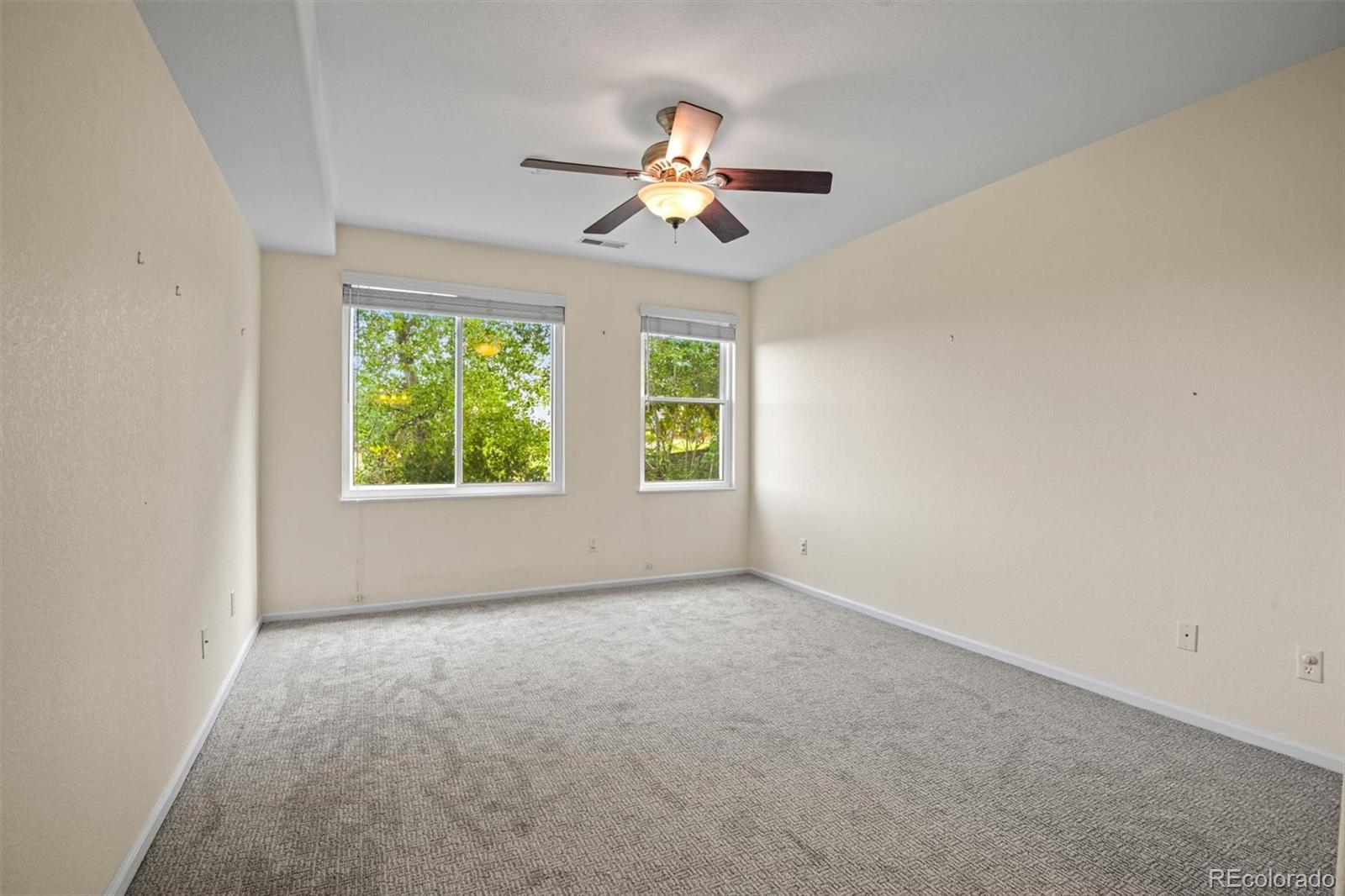 10230 Rustic Redwood Way Highlands Ranch, CO 80126 - Photo 33 of 50 an empty room that has a window