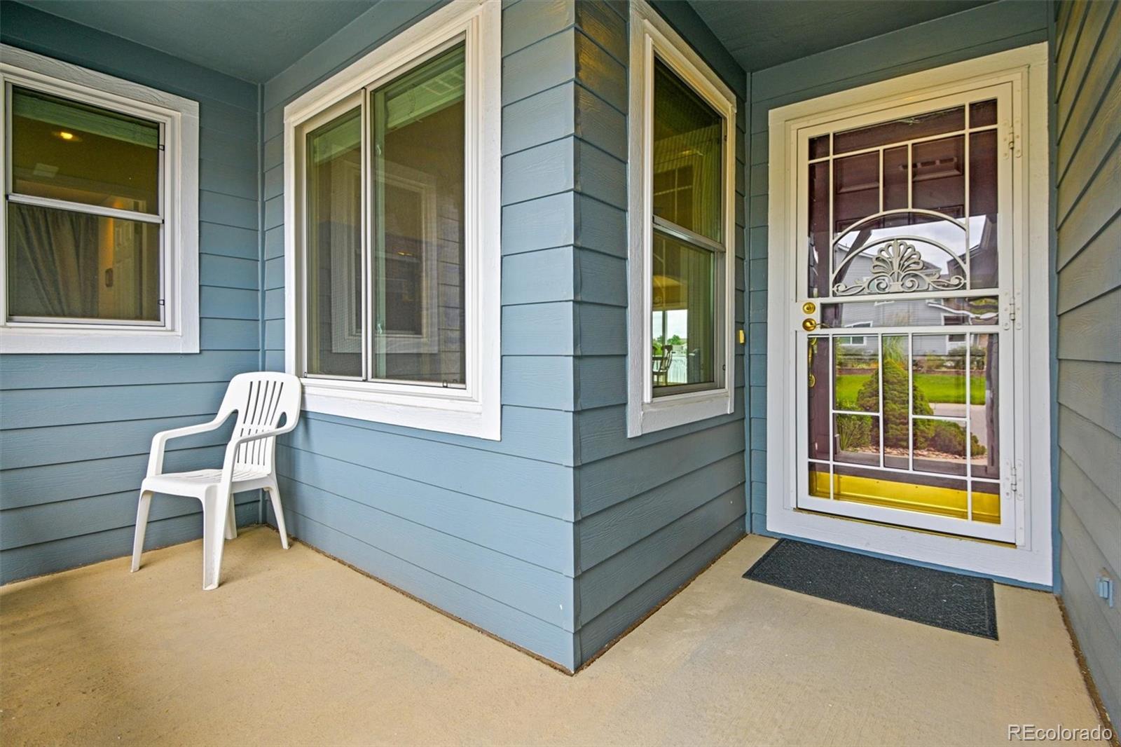 10230 Rustic Redwood Way Highlands Ranch, CO 80126 - Photo 5 of 50 a house that has a window in it