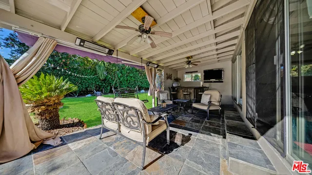 a view of a garden with a bench