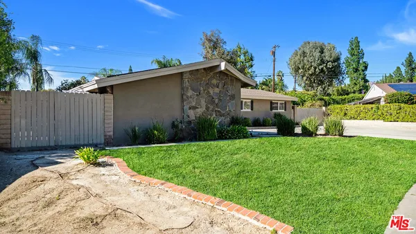 a front view of house with yard