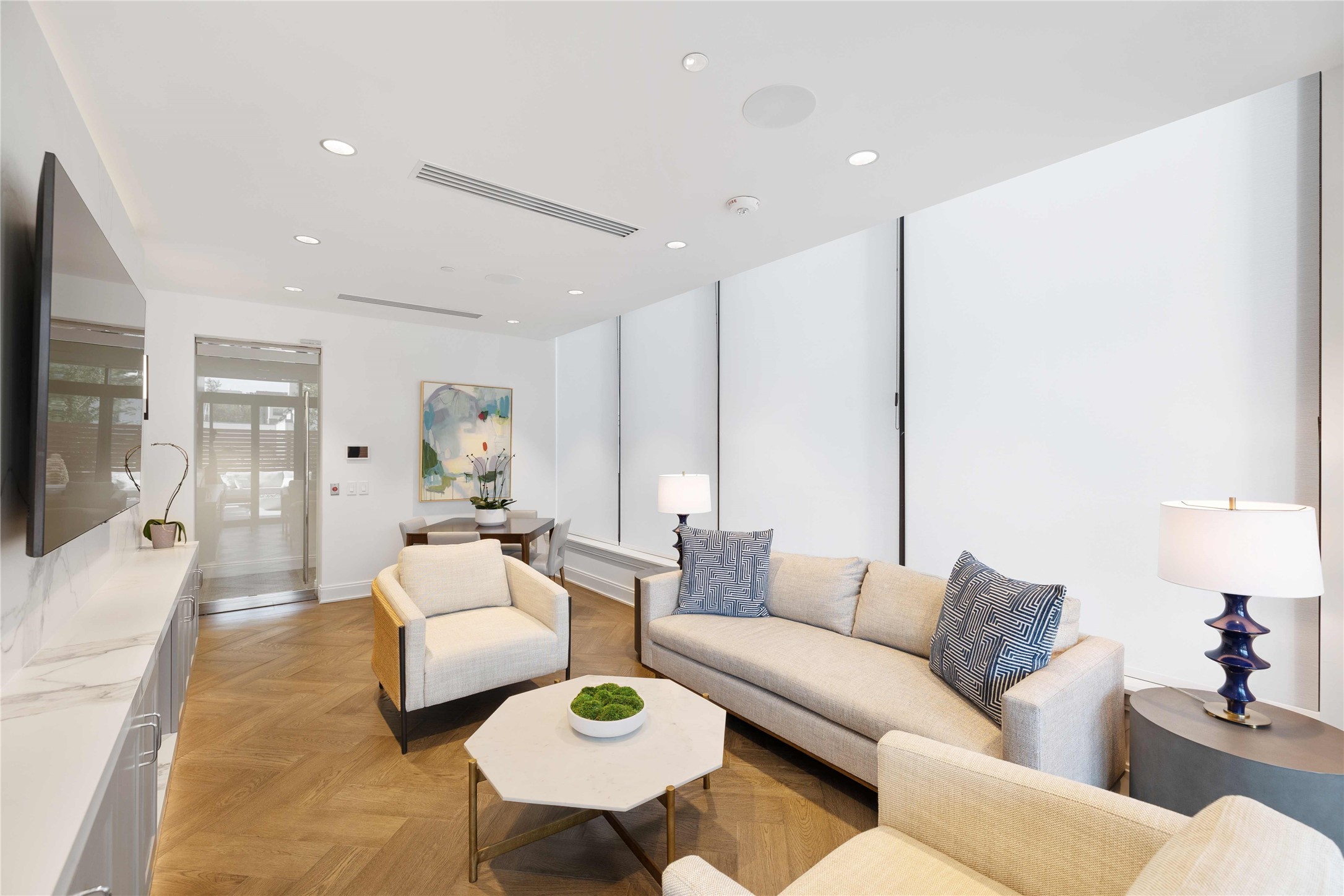 2323 West Main Street, Unit 305 Houston, TX 77098 - Photo 12 of 17 Interior of residence lounge, located on terrace level. Opens to outdoor space for additional entertaining space.