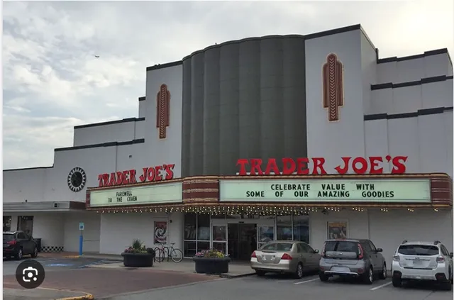 a view of a red door with a red gate