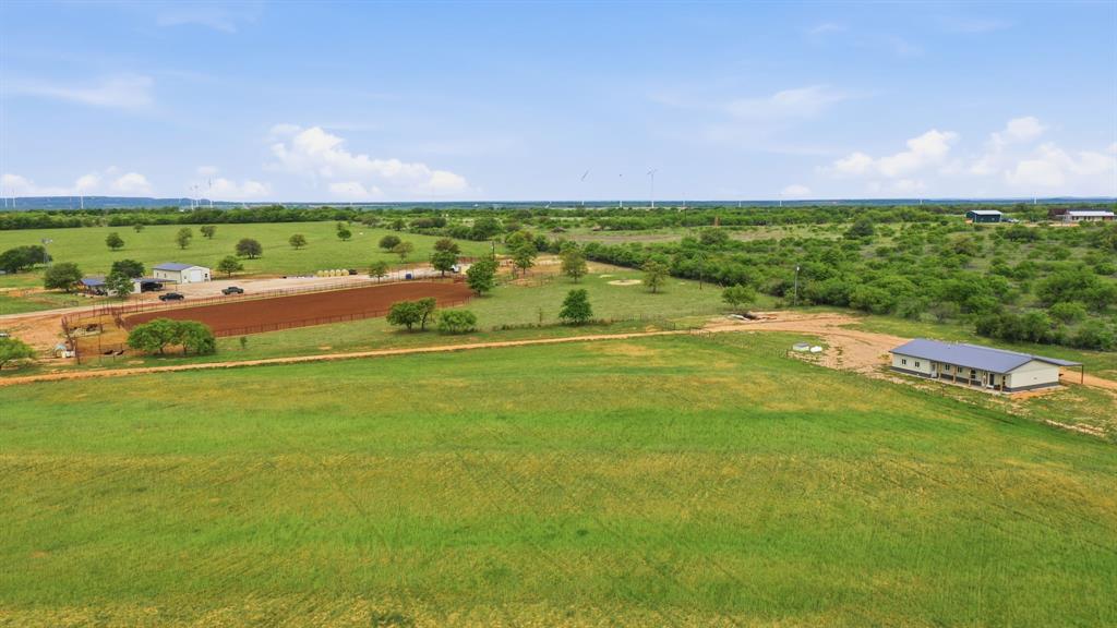 8315 County Road 403 Cisco, TX 76437 - Photo 1 of 40 a view of a green field with clear sky