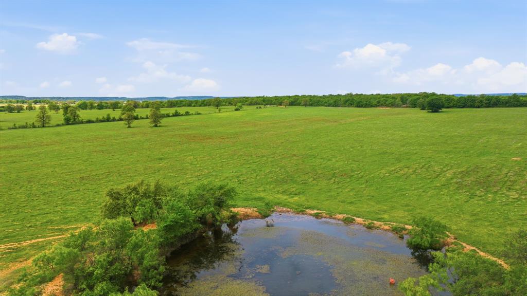 8315 County Road 403 Cisco, TX 76437 - Photo 36 of 40 a view of a lake with a big yard