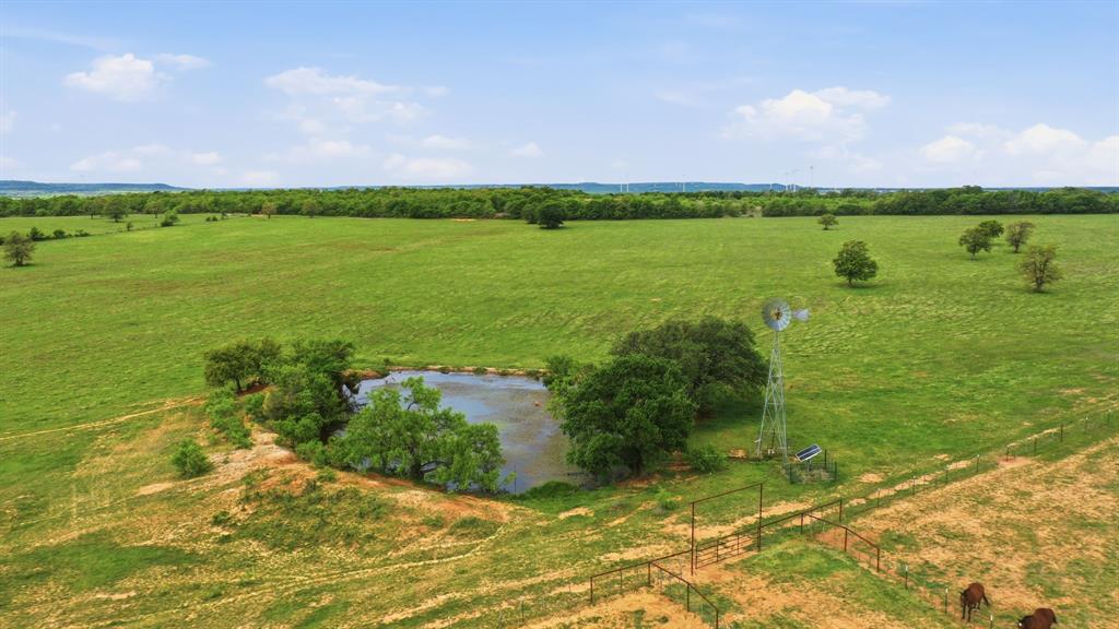 8315 County Road 403 Cisco, TX 76437 - Photo 38 of 40 a view of a lake with a big yard