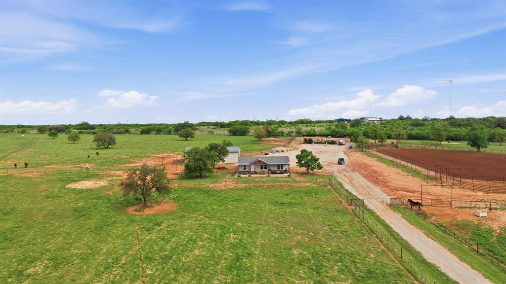 8315 County Road 403 Cisco, TX 76437 - Photo 4 of 40 a view of a lake with houses in the back
