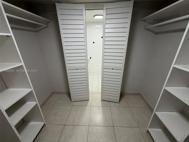 a view of entryway with stairs and a window