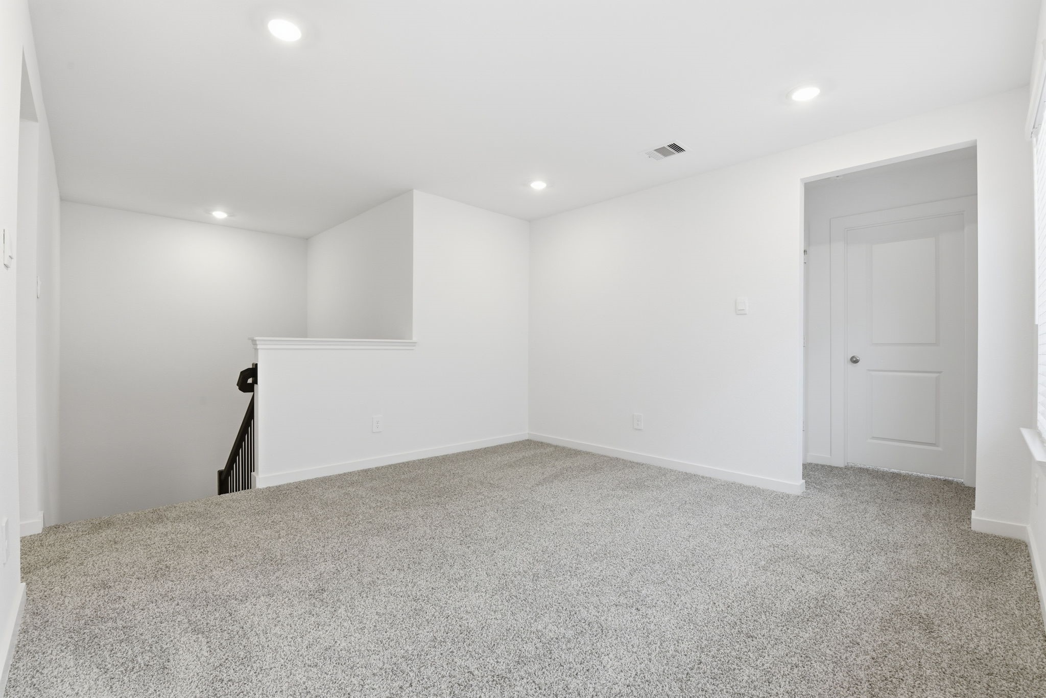 3534 Blue Mockingbird Street Katy, TX 77494 - Photo 11 of 39 Landing on the second floor into the large game room.