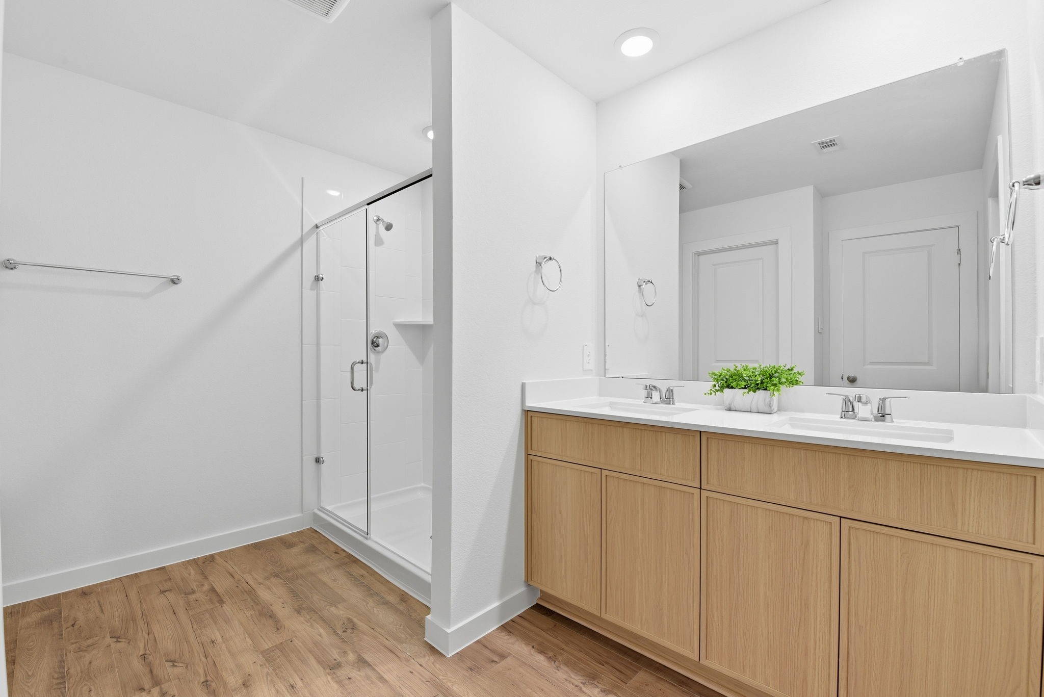 3534 Blue Mockingbird Street Katy, TX 77494 - Photo 16 of 39 Primary bathroom features dual vanities and stand alone shower.