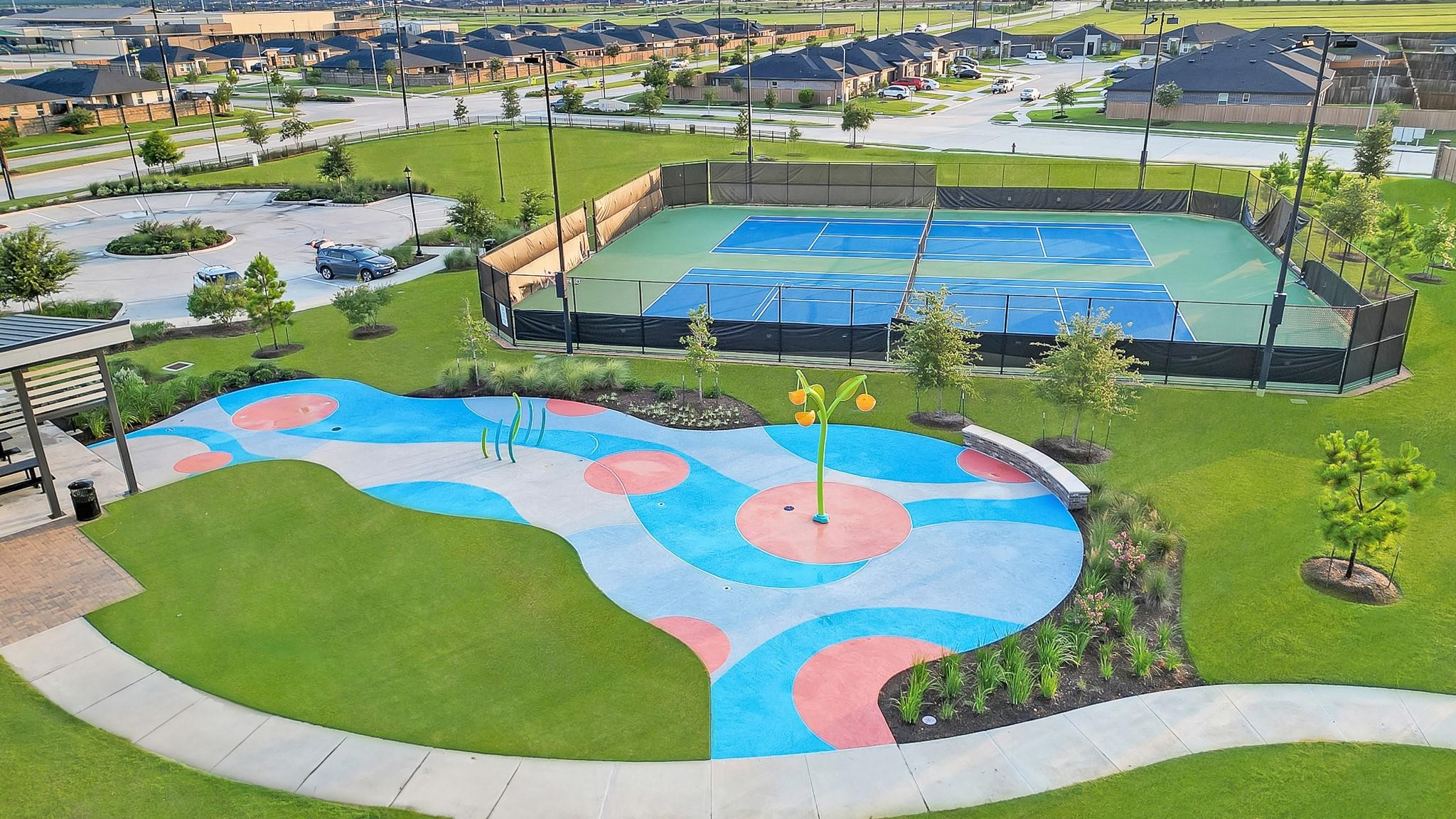 3534 Blue Mockingbird Street Katy, TX 77494 - Photo 36 of 39 Community amenities include parks, splash pads, pickleball courts, among many others.