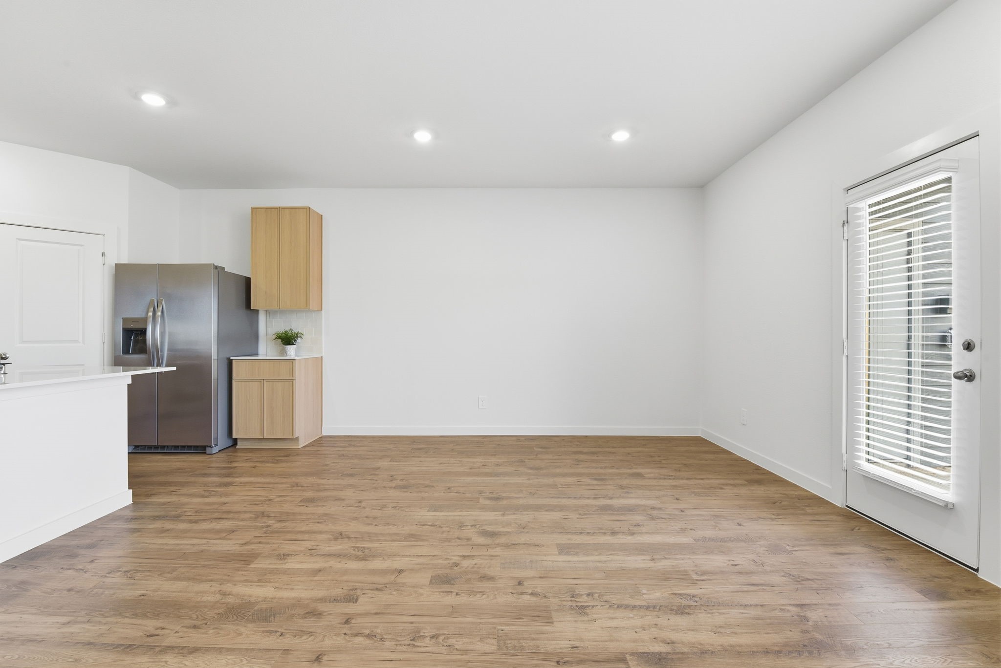 3534 Blue Mockingbird Street Katy, TX 77494 - Photo 4 of 39 View of the loving area, to the right, access to the back yard.