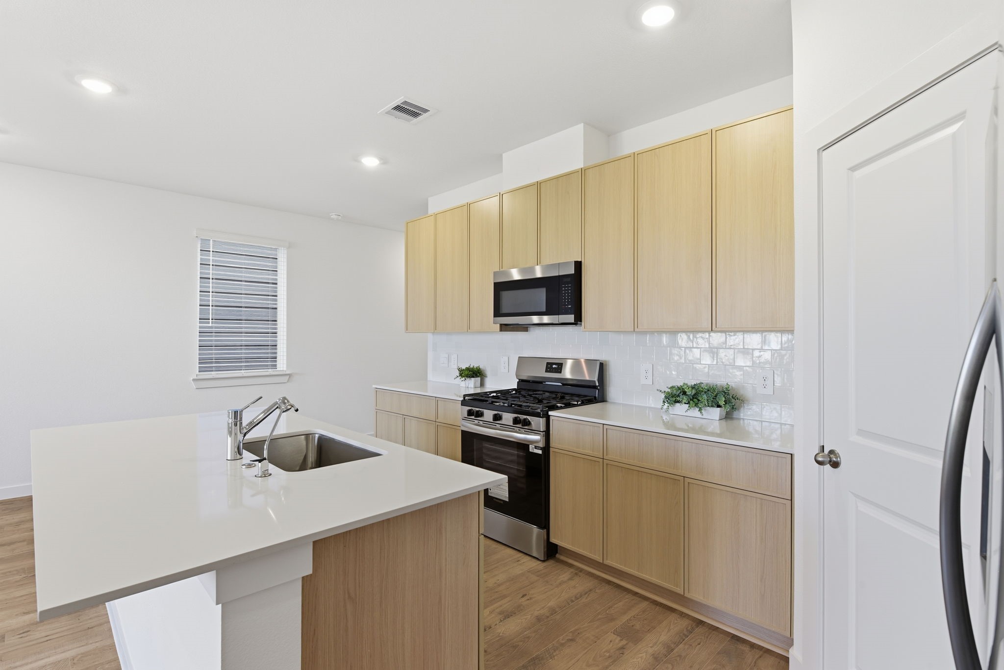 3534 Blue Mockingbird Street Katy, TX 77494 - Photo 5 of 39 This functional kitchen will be the centerpiece for any social gathering.