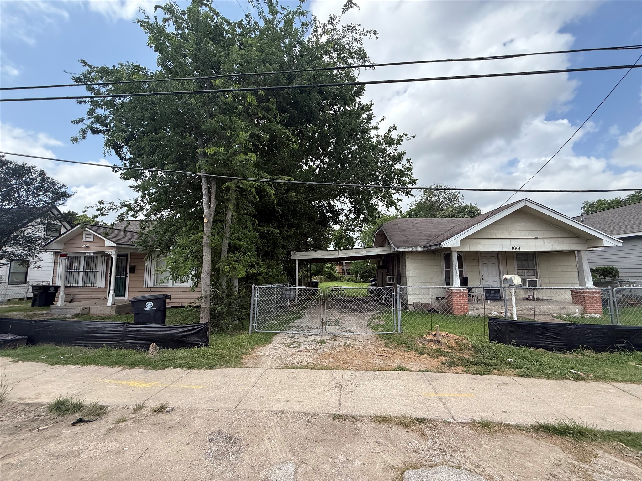 1001 Booth Street Houston, TX 77009 - Photo 2 of 12 a front view of a house with a yard
