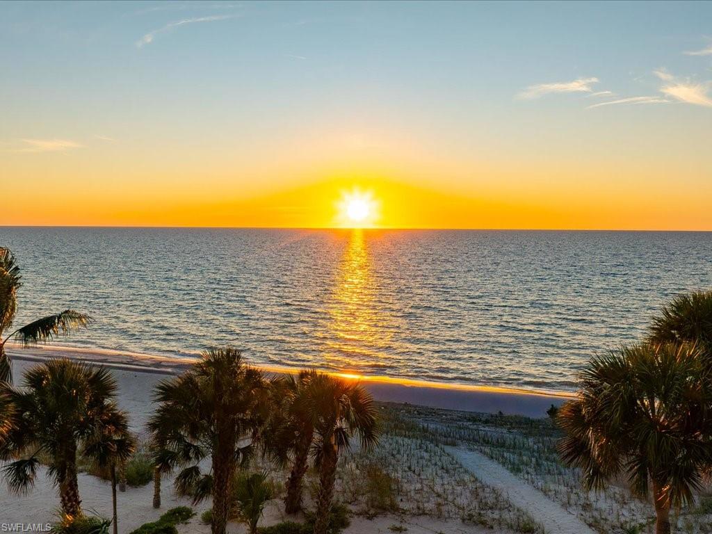 7409 Bay Colony Drive Naples, FL 34108 - Photo 12 of 46 Water view with local beach